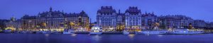 Stockholm Strandvagen waterfront harbour hotels illuminated at dusk panorama Sweden
